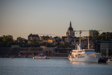 Fototapeta premium Autumn sea landscape in the inner harbour of Stockholm with ferries and boats