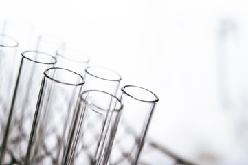 Science tubes arranged on the shelf.