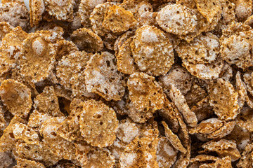 Corn flakes background, top view