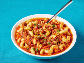 portion of goulash of elbow pasta,close-up