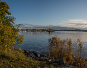 Autumn sea landscape in the inner harbour of Stockholm with ferries and boats.