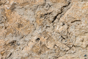 Ancient stone building mix of the exposed facade of the building during restoration. Grunge Abstract Background