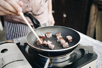 Homemade Fried Marinated juicy Grilled Kobe diced beef steak in a hot pan