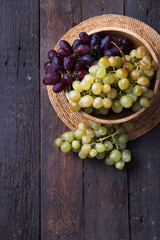Healthy fruits Red and White wine grapes on wooden backgrounds