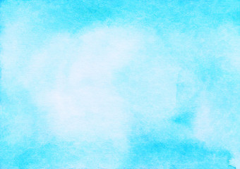 Light blue watercolor frame background. Sky blue aquarelle stains on paper. 