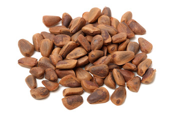 Pine nuts on white background