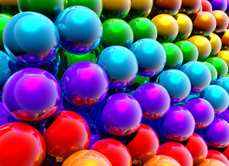 Abstract rainbow balls background or wallpaper with group of shiny colorful 3d objects. 3D illustration
