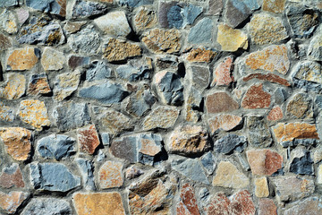 a wall of stone pieces