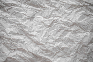 White crumpled paper close up texture background
