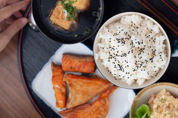 Close up Japanese food Teriyaki salmon with rice set served on wooden table