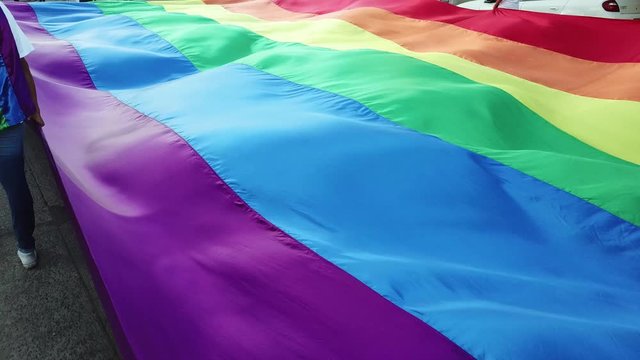 approach to rainbow flag in gay protest