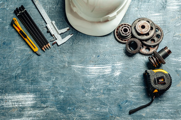 Machine engineer tools set on dark wooden background