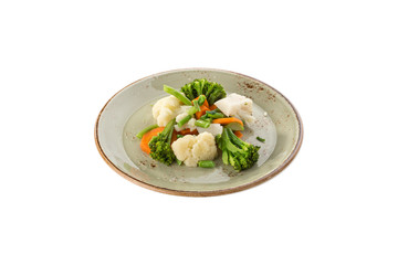 Vegetable mix with carrot, broccoli and cauliflower on grey plate isolated on white background