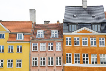 Fototapeta na wymiar Colourful facades along the Nyhavn Canal in Copenhagen, Denmark