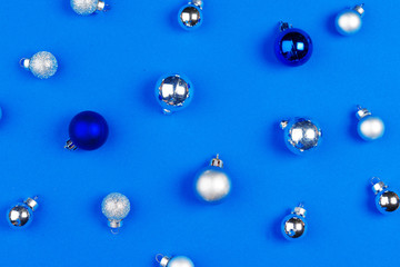 Small shiny christmas baubles background. Christmas decor