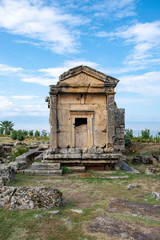 Fototapeta na wymiar Ruins of tombs in necropolis, ancient Hierapolis, Pamukkale, Anatolia, Turkey. UNESCO world heritage site
