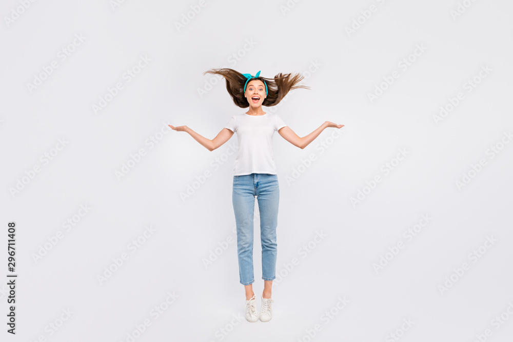 Poster Full length photo of amazed girl feel fun on spring holidays enjoy wind her hair blowing flying wonder scream wow omg wear casual pin-up pinup style outfit sneakers isolated white color background