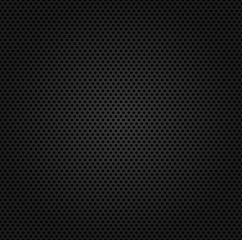 Circle perforated carbon speaker grill texture.