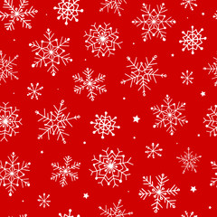 feestelijk kerst naadloos patroon met hand getrokken sneeuwvlokken op rode achtergrond