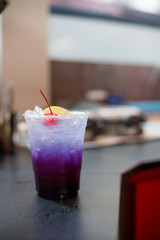 Magic Butterfly Pea Lemonade and soda water in plastic glass