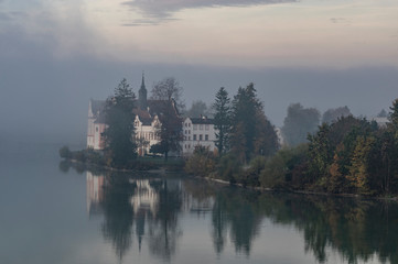 school in bavaria at a foggy morning