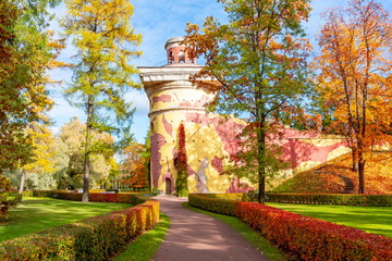 Fototapeta premium Ruin Tower in Catherine park in autumn, Tsarskoe Selo (Pushkin), St. Petersburg, Russia