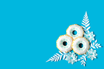 Paper donuts, snowflakes and frosty leaves