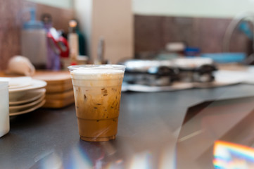 ice latte coffee in plastic glass