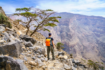 Hiking on Balkony Walk trail in Jebel Shams, Oman