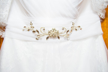 Photo of a beautiful wedding dress belt with stones