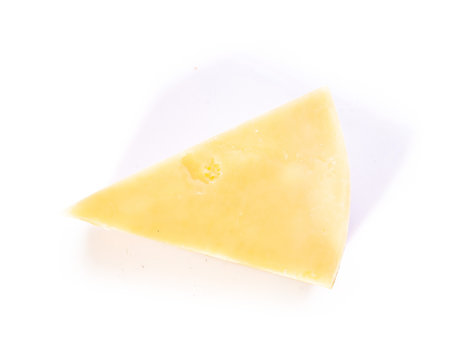 Piece of cheese isolated on white bachground
