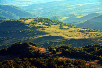 Fototapeta premium landscape over hills and valleys in Transylvania
