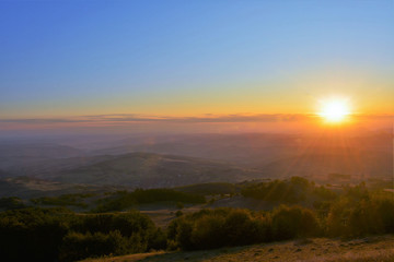 A sunrise over the hills