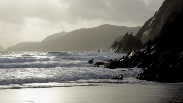 footage of the rocky coastline at Coumeenoule in the dingle peninsula on the southern coast of Ireland, a filming location of the star wars movies