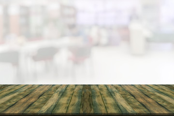 Empty wooden board space platform with library blur background