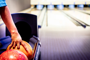 hand holding a bowling ball