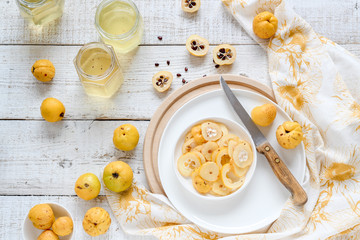 Preparing quince syrup for winter, a preserve of natural source of vitamin C