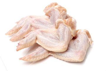 Raw chicken wings on a white background