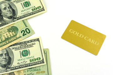 Gold discount card and dollar bills on white background
