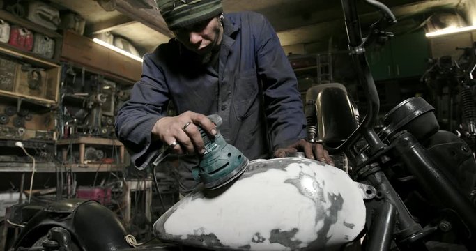Motorcycles detailing series, polishing gas tank after putty in repair shop