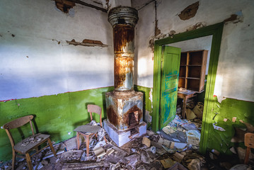 Interior of ruined post office in Zymovyshche, small village located in Chernobyl exclusion area, Ukraine