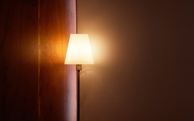 Floor lamp illuminating, in the corner of living room