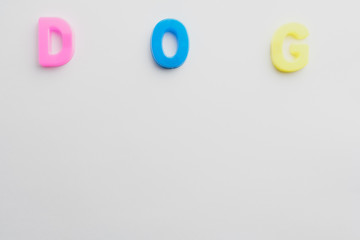 Fototapeta premium Letter to learn spelling,Colorful letter help children to learn on white background and copy space