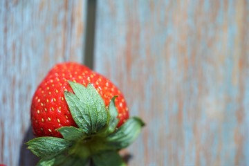 strawberry on vintage wooden background