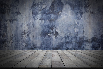 gray cemen wall and stone floor