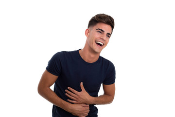 Handsome young man laughing in a photo studio