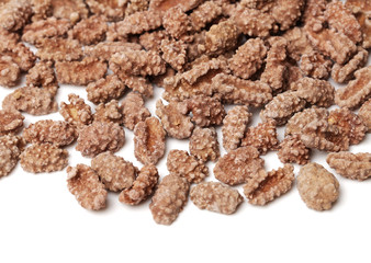 Chocolate nuts on white background