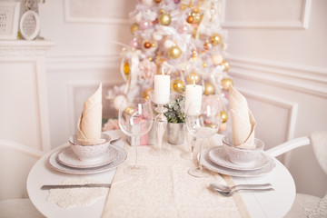 Festive Christmas table for two persons. Winter holidays - Christmas and New Year.