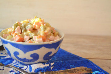 Traditional Russian Olivier Salad, russian gzhel style, copy space