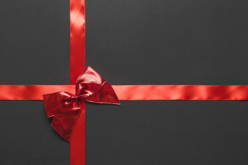Ribbons and bow onÂ black background